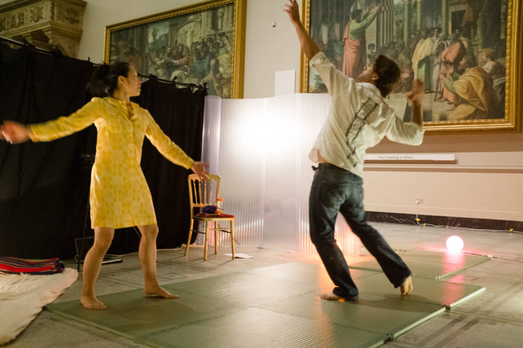 Movement Alphabet by Jan Lee and Tim Murray-Browne interactive digital art installation visualizing body movement - Jan and participant at Victoria and Albert Museum exhibition July 2016